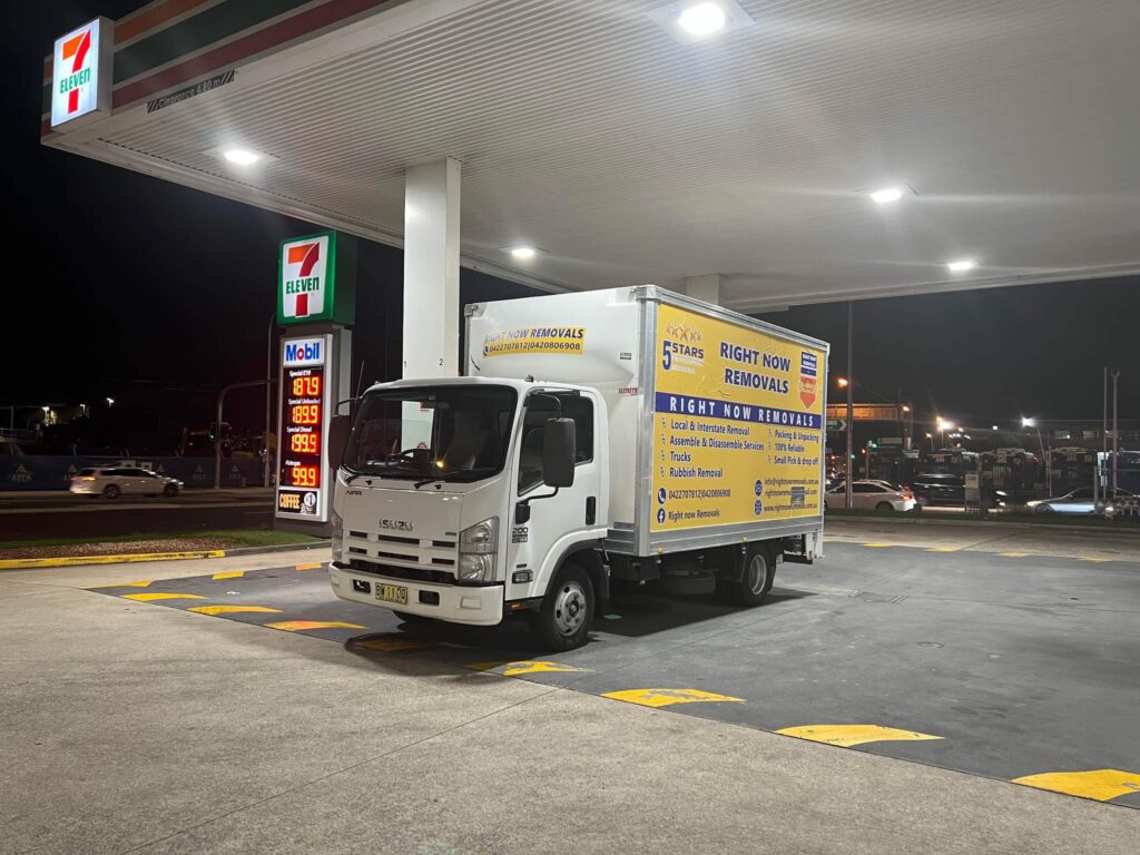 Right Now Removals truck at a service station, gearing up for an interstate move